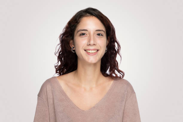 istock Beautiful young women smiling to camera 1169742485