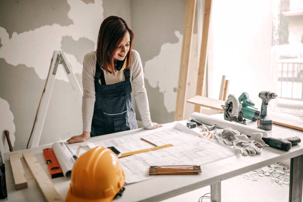 istock Woman renovating 1169743551