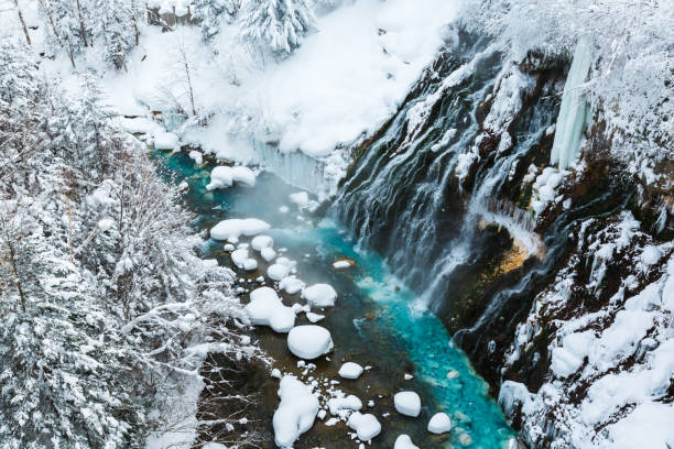 Shirogane Waterfall in Winter at Biei Patchwork Road, Hokkaido, Japan Biei Town, Hokkaido, Japan, Shirogane Blue Pond, Beard hokkaido stock pictures, royalty-free photos & images