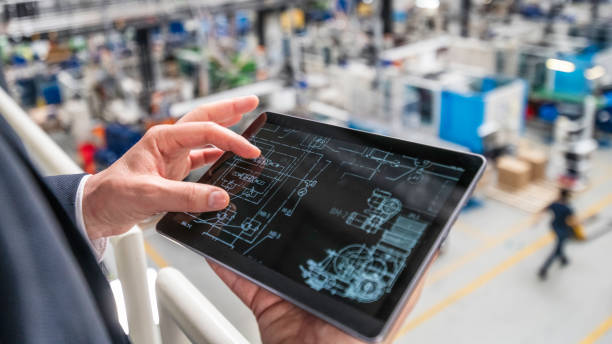 istock Factory diagram on a digital tablet 1169752654
