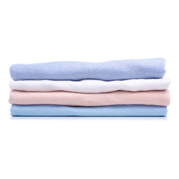 istock Stack folded shirt clothing, pastel color 1169752656