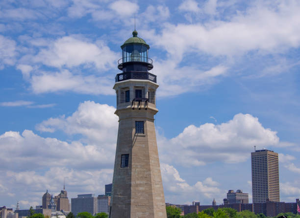 Lighthouse with Buffalo city skyline stock photo
