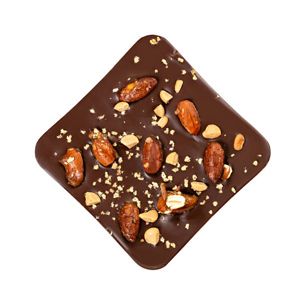 istock Bitter chocolate bar with almonds isolated on white background 1169775065