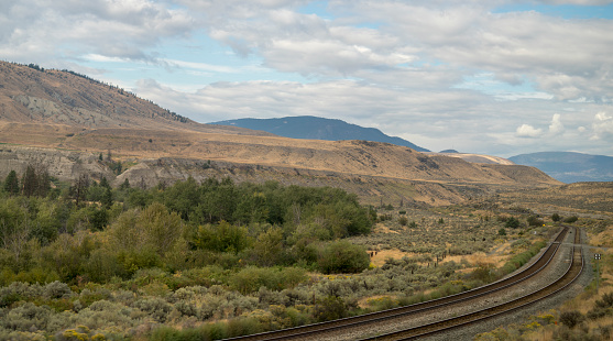 Train tracks at crossing in rural western town in Dragoon, Arizona, United States