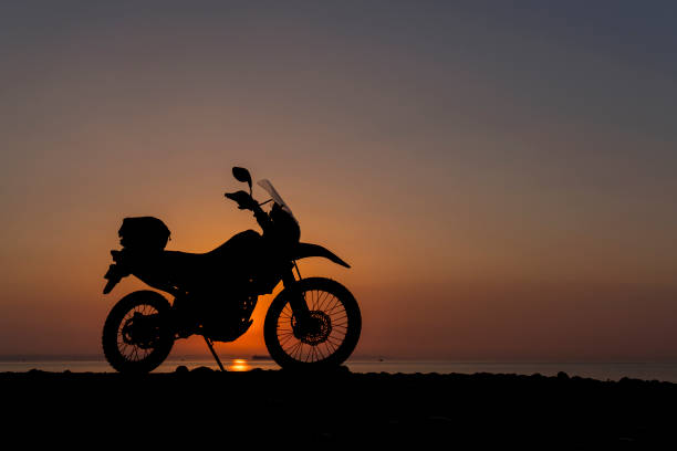 istock Motorcycle ride at sunrise 1169779547