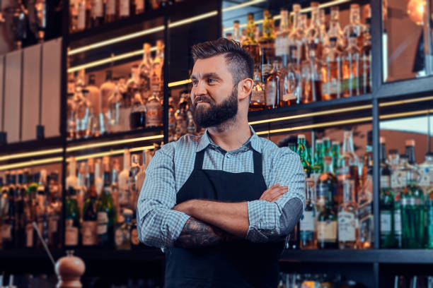istock Handsome barman is posing for photographer 1169784094
