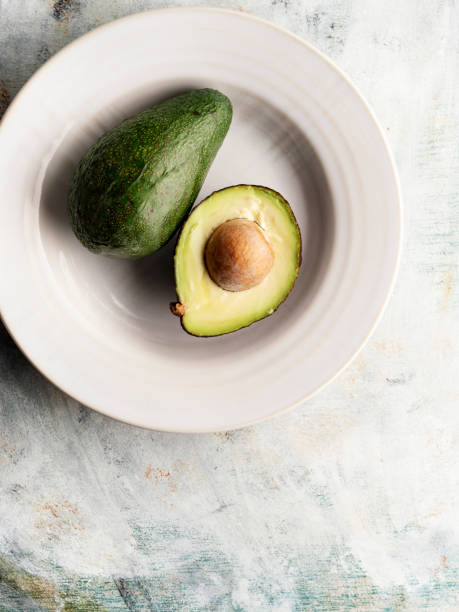 istock Fruit: Avocado,Ripe avocado cut in half Full,Fresh avocado 1169785795