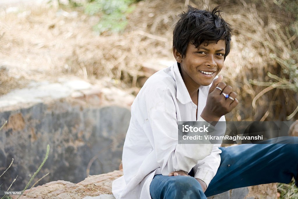 Candid portrait of One Cheerful Rural Indian Boy Child Indian Rural Child...(see more India images) 8-9 Years Stock Photo