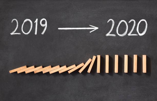 istock New Year Business Concept. 2020 Approaching, on Blackboard 1169788658