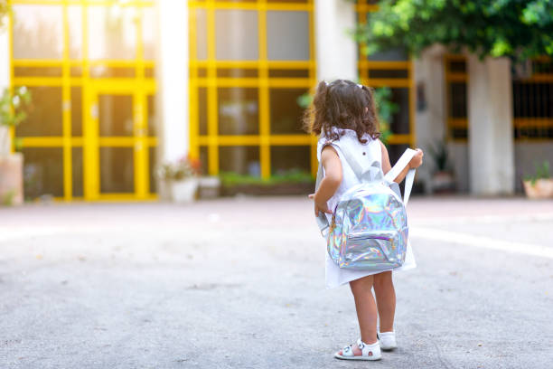 istock Girl At School Yard On First Day In September. 1169788661