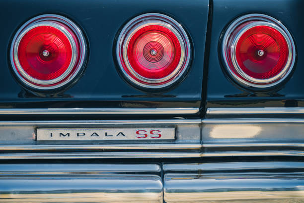 Detail of a Chevrolet Impala SS oldtimer car at the US Car Meeting event in Ulm, Germany Ulm, Germany - August 4, 2019: Detail of a Chevrolet Impala SS oldtimer car at the US Car Meeting event in Ulm, Germany. car classic light tail stock pictures, royalty-free photos & images