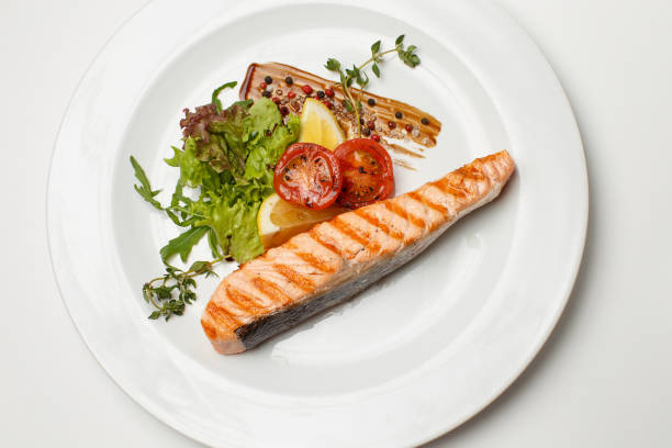 istock grilled salmon steak with vegetable 1169789753