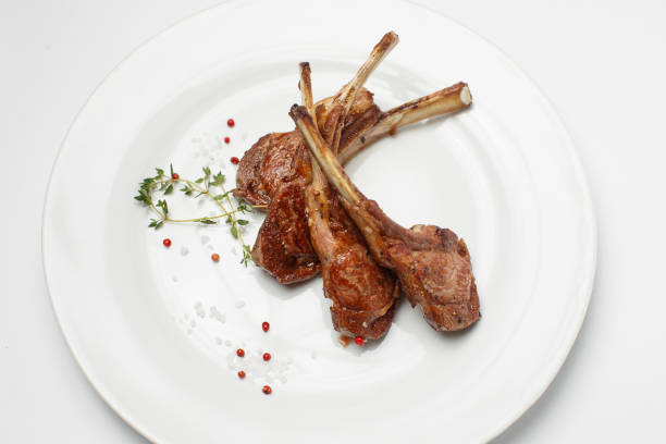 istock pork ribs on a white plate 1169796264
