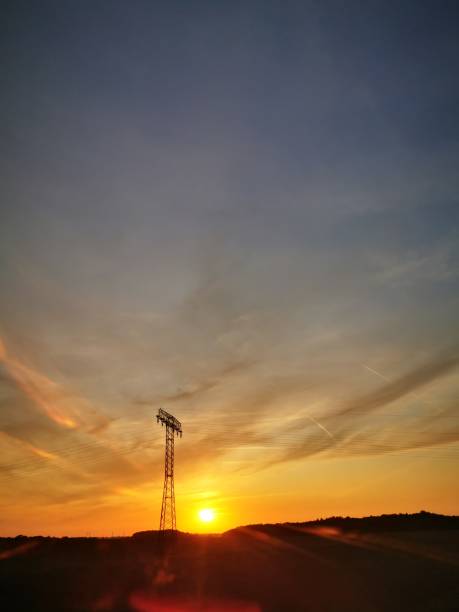 istock Sunset with blue and yellow sky 1169797321