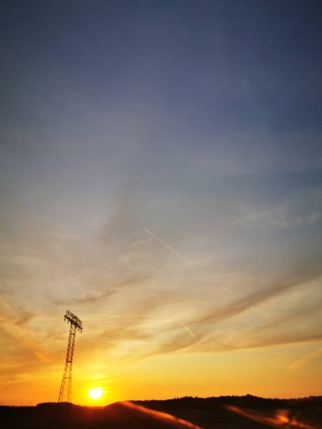 istock Sunset with blue and yellow sky 1169797373