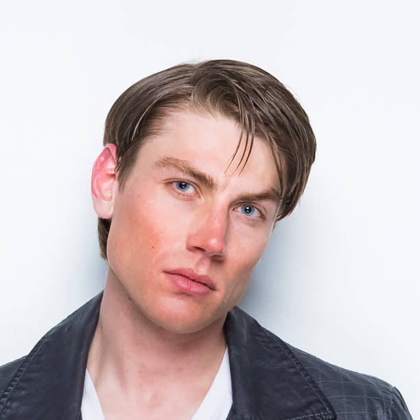istock Good looking man wearing a leather jacket 1169800835