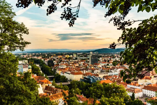 View at Graz city with his famous buildings. River mur, clock tower, art museum, town hall. Famous tourist destination in Austria