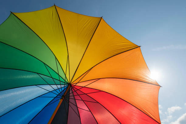 istock Colorful parasol in summer with backlight 1169803147