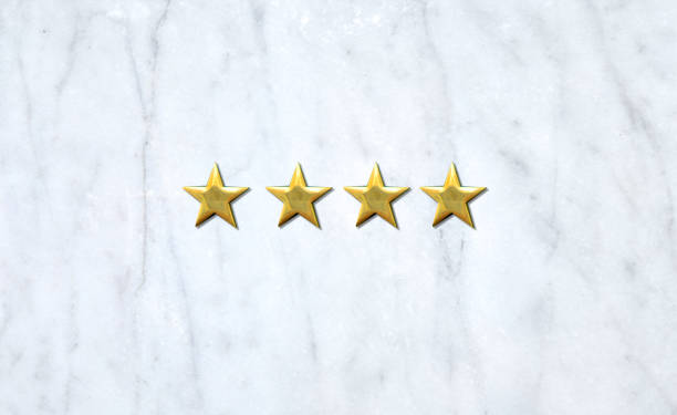 istock Four stars symbol on marble background texture for your text or design 1169803199