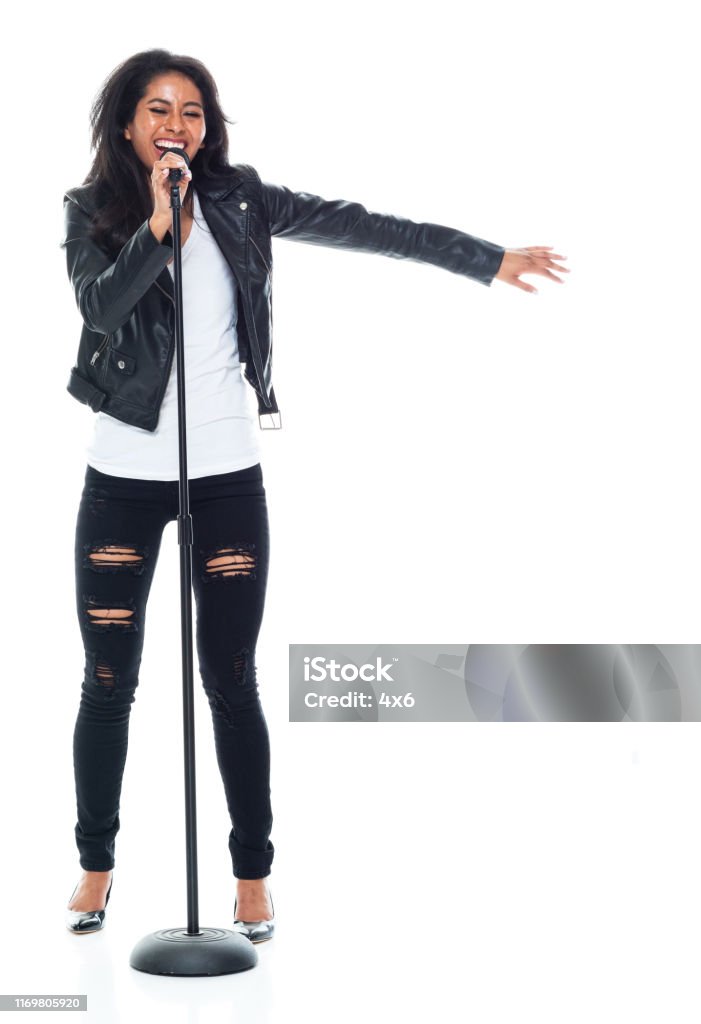 Bautiful Woman Wearing A Leather Jacket And Singing Like A Rock Star ...