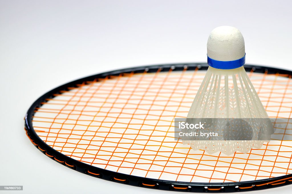 Shuttlecock and racket Badminton racket and plastic shuttlecock. Badminton - Sport Stock Photo