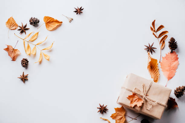 istock Handmade paper gift box with foliage dried leaves 1169808981