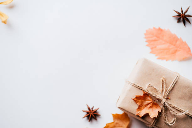 istock Handmade paper gift box with foliage dried leaves 1169808991