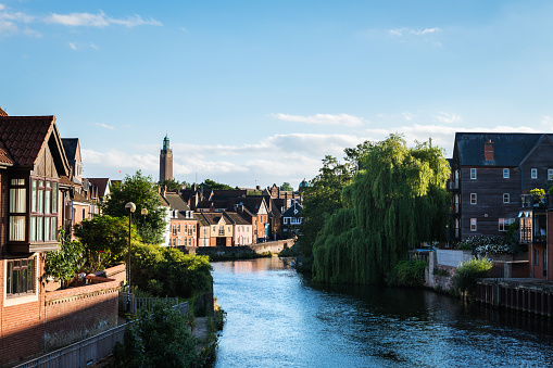 Traditional houses by the river Wensum in Norwich at dusk, Norfolk.