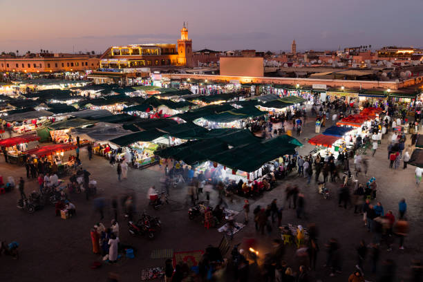 istock Evening Djemaa El Fna Square with Koutoubia Mosque, Marrakech, Morocco 1169810929