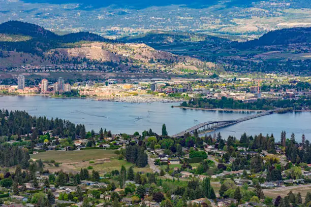 A view of the Kelowna Skyline, Okanagan Lake and the William R Bennett Bridge from Mount Boucherie in West Kelowna British Columbia Canada in the summer