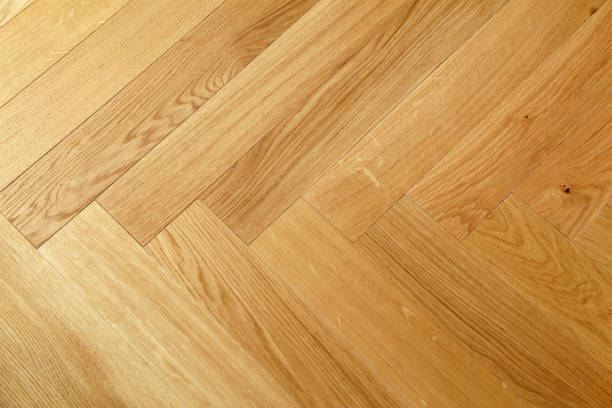 istock Seamless wood parquet texture, chevron sand color 1169819818
