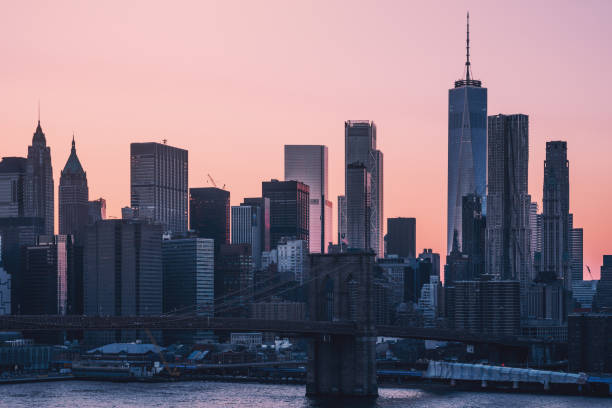 istock Manhattan with Brooklyn Bridge in the foreground at sunset, NYC, USA 1169820785
