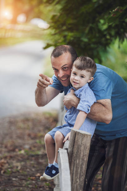 istock Single father and son hanging out outdoors 1169823656