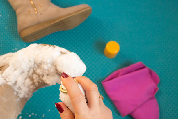 istock Cleaning suede boots 1169835078