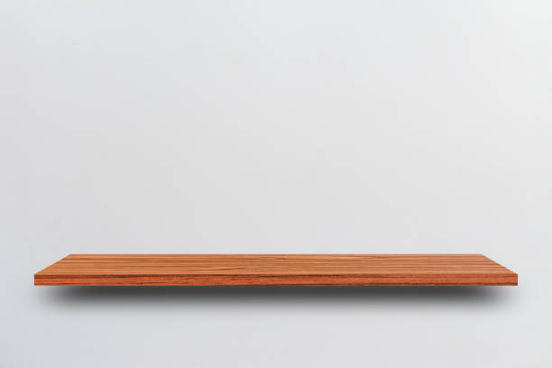 istock Front view empty wooden shelf and grey wall. Design concept 1169836039