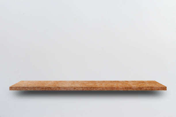 istock Front view empty wooden shelf and grey wall. Design concept 1169836709