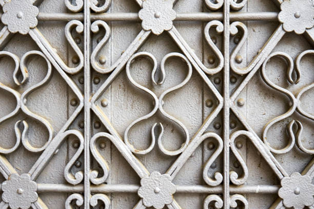 istock Pattern Of Curvy Medieval Ironworks Painted In Grey 1169838326