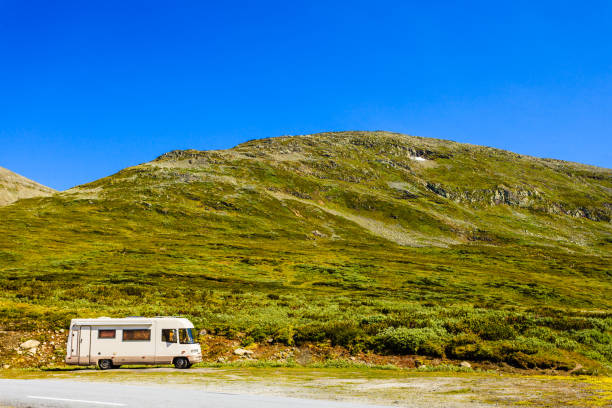 istock Camper car in norwegian mountains 1169838516
