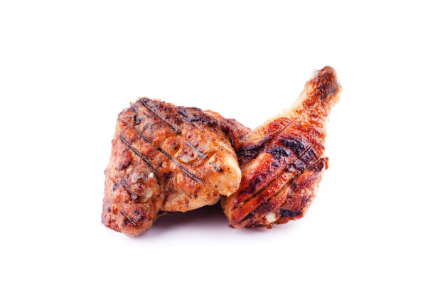 istock fried on chicken legs.grilled broiler thighs isolated 1169840961
