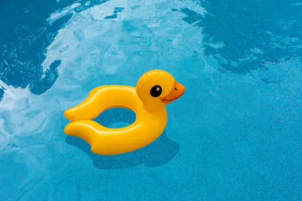 Yellow rubber ducky pool float