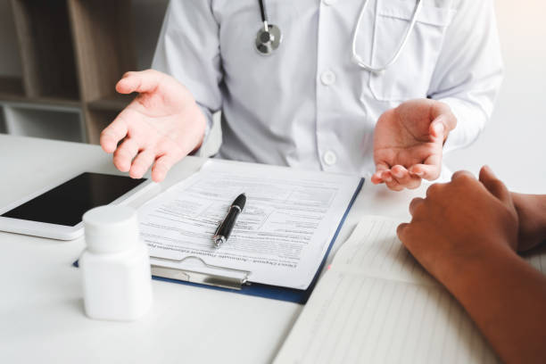 istock Doctors and patients Consulting about Treatment guidelines at office 1169847397