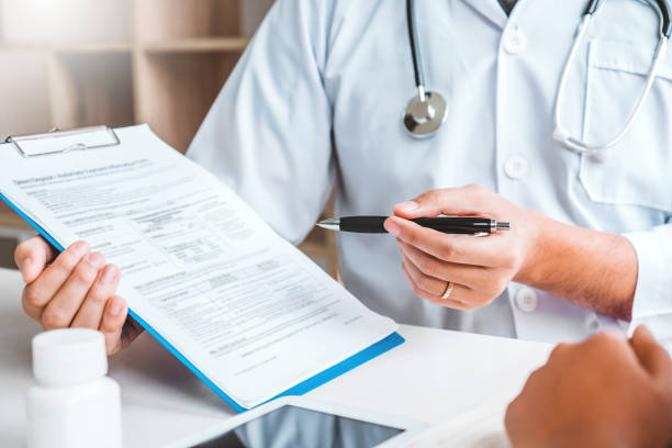istock Doctors and patients Consulting about Treatment guidelines at office 1169847434