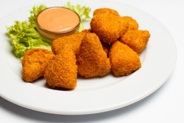 istock deep fried cheese slices with a sauce 1169856078