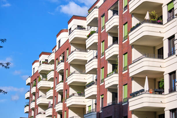 istock Modern tenement houses 1169860411