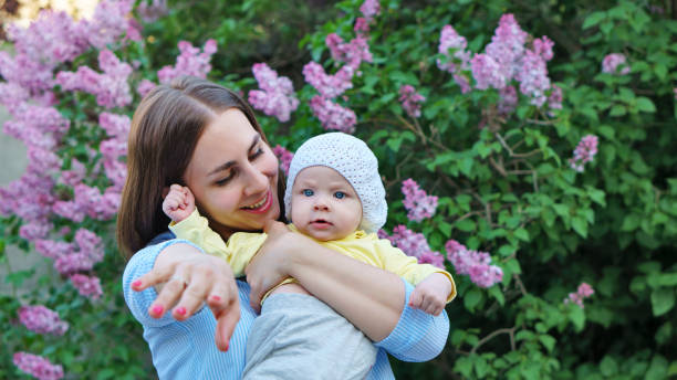 istock Mom and baby for a walk 1169860520