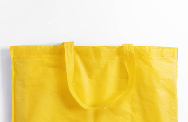 istock Close-up, Yellow reusable fabric bag, on white background 1169862731