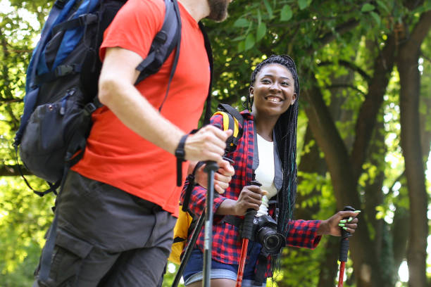 istock Young couple hiking on a mountain 1169867200