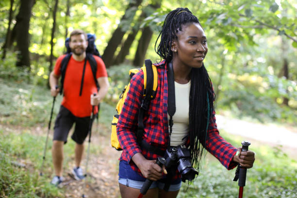 istock Young interracial couple in nature 1169867236