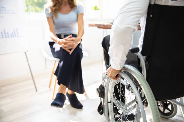 istock Disabled Businessman In Meeting 1169870173