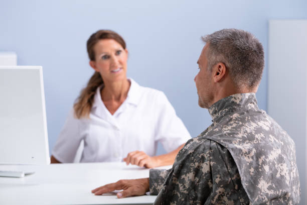 istock Female Doctor Discussing With Army Soldier Suffering From Ptsd 1169870530
